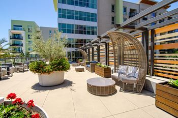 Semi-private social areas with sand fire pits & wooded elevated deck